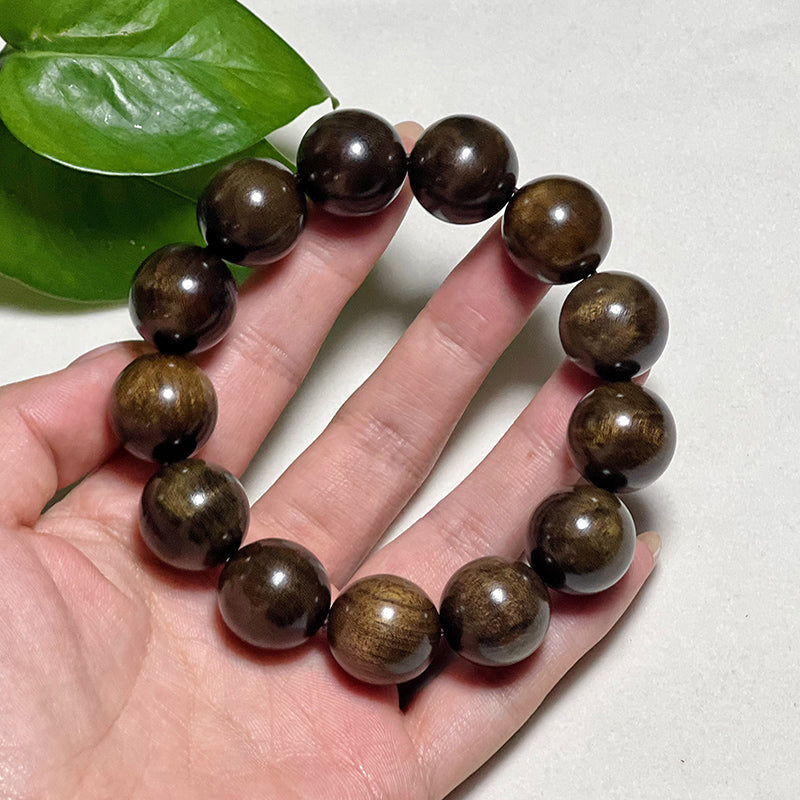 1.8mm genuine Phoebe zhennan wood bracelet, made of authentic ebony with full golden veins and fossilized wood texture.
