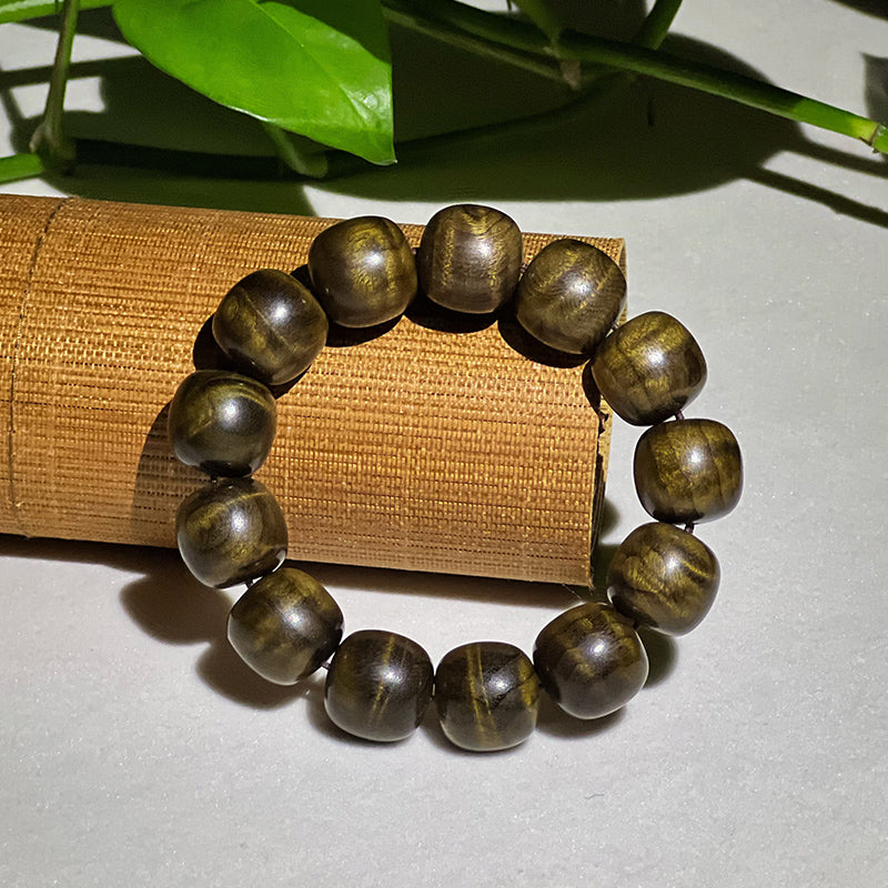 2.0 cm diameter Golden Nanmu and Ebony wood beaded bracelet with water ripple pattern.