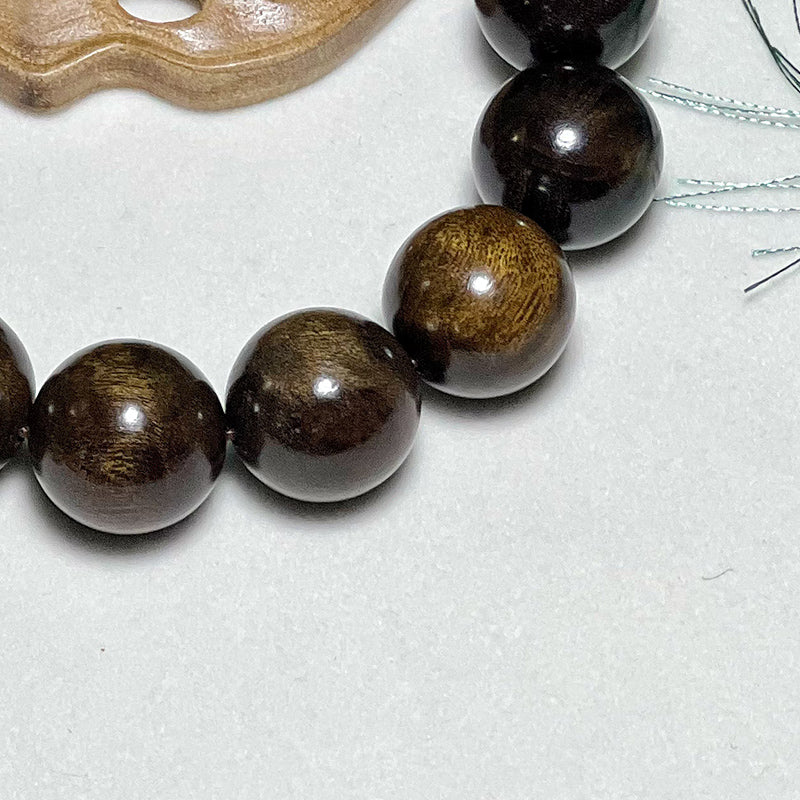 1.8mm genuine Phoebe zhennan wood bracelet, made of authentic ebony with full golden veins and fossilized wood texture.