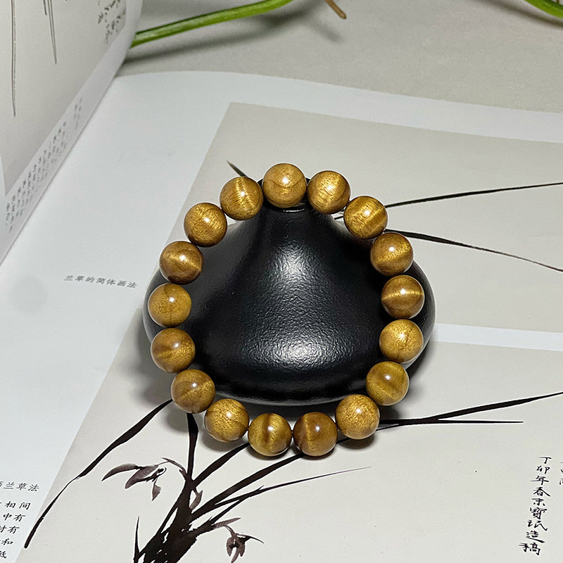 1.2cm genuine golden nanmu wood prayer beads, made from aged wood with a water ripple pattern.