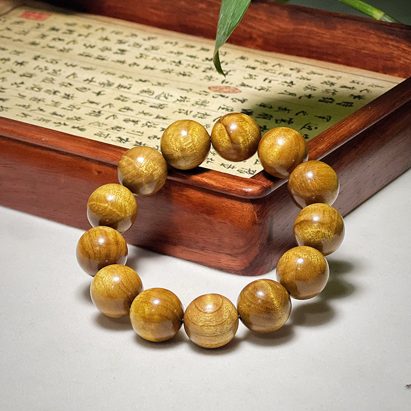 1.8mm genuine Phoebe zhennan wood bracelet with water ripple pattern.