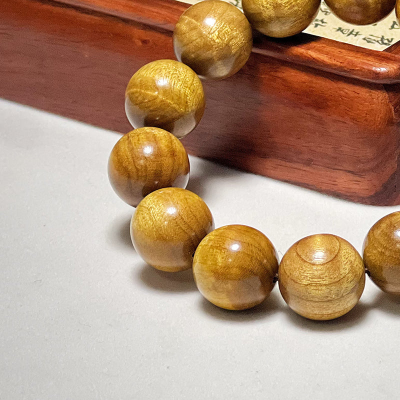 1.8mm genuine Phoebe zhennan wood bracelet with water ripple pattern.