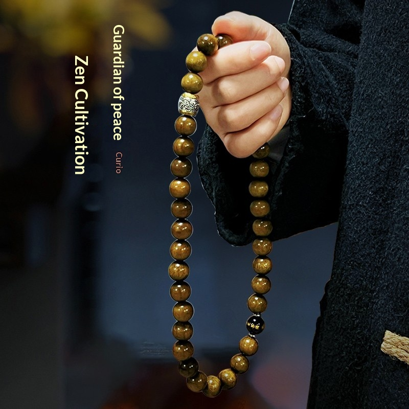 1.2 Black and gold golden nanmu zodiac double-ring bracelet